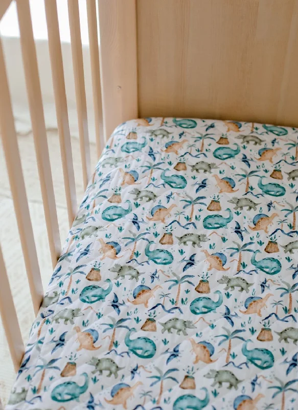 Quilted Cotton Sheets for a Warm and Inviting BedBambella Designs 2-in-1 Waterproof Cot Sheet & Mattress Protector | Wild Dinos