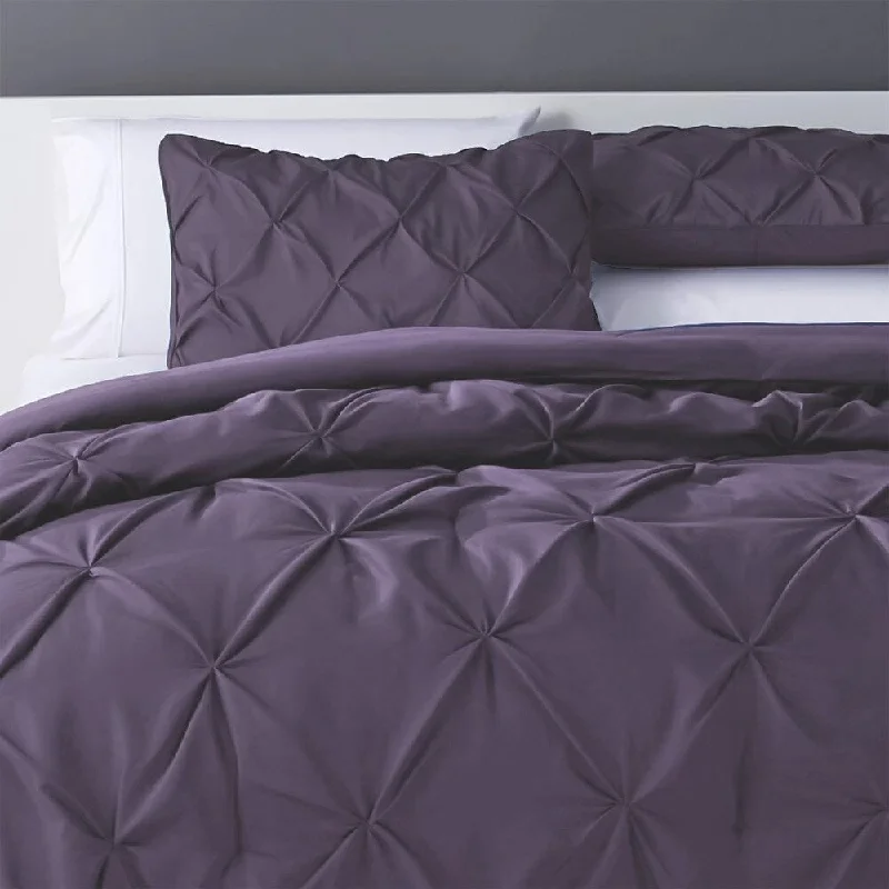 Goose down comforters known for their superior quality and insulationKotter Home Pinch Pleat Pintuck Comforter Set