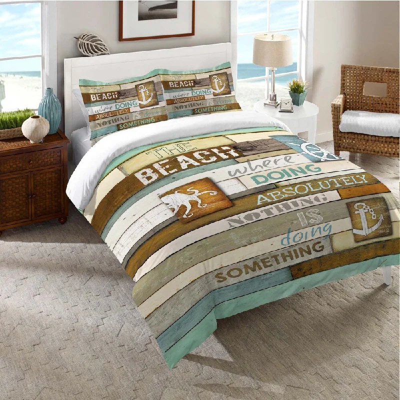 Microfiber - filled comforters that are lightweight and easy to care forLaural Home Beach Words Comforter