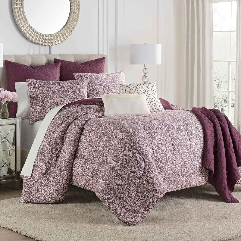 Microfiber - filled comforters that are lightweight and easy to care forMartex Savino 8-Piece Comforter Set